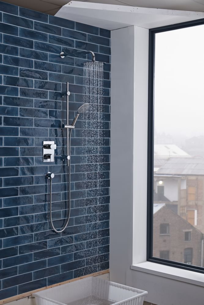 Crew concealed dual function shower water on lifestyle slide image Crew concealed dual function shower water on lifestyle slide image