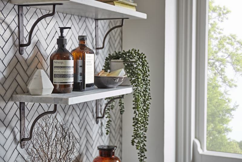 How to style a shelf depth of field single shelf aesop soap plant detail window scene