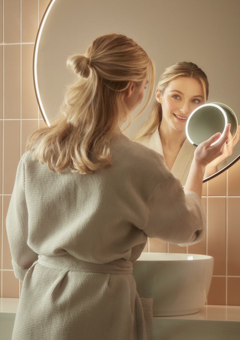 Loop Mirror with model vanity removal lifestyle