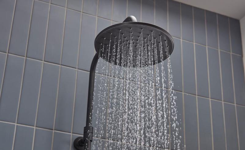 Merit Black Shower Head Water On Lifestyle