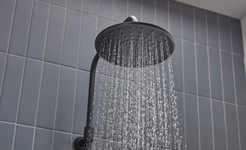 Merit Black Shower Head Water On Lifestyle Merit Black Shower Head Water On Lifestyle