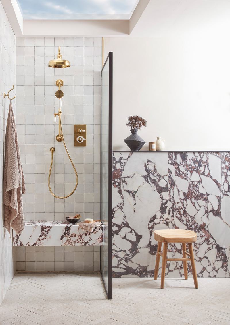 Bathroom ideas dark veined marble and brass shower