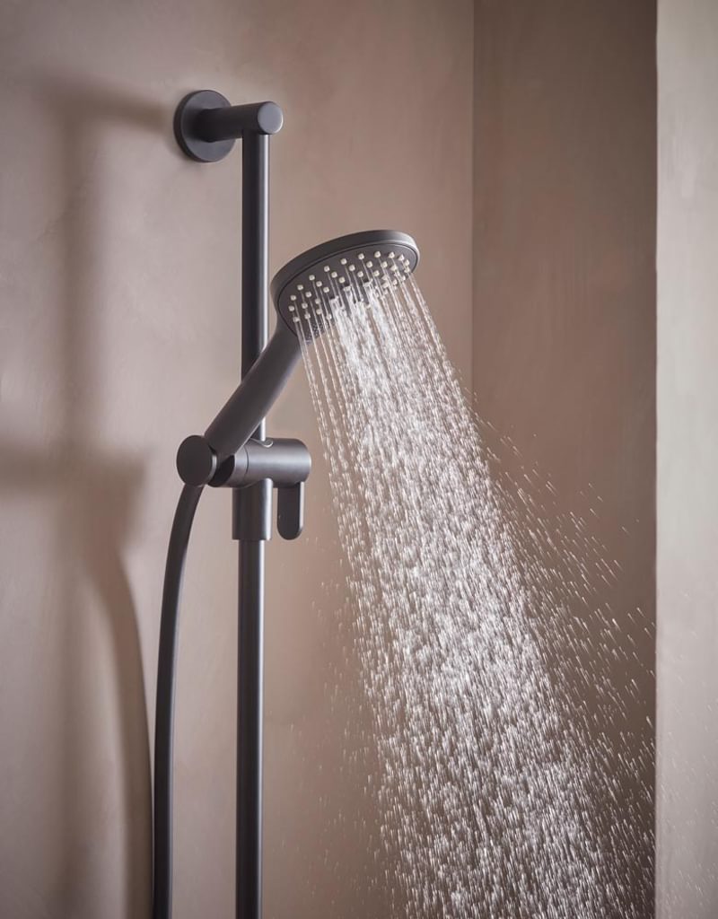 Tavistock Axiom Shower Handset Showing Functions Lifestyle V2 Tavistock Axiom Shower Handset Showing Functions Lifestyle V2