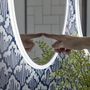 Aster 490mm oval illuminaed mirror close up of sensor lifestyle copy slide image