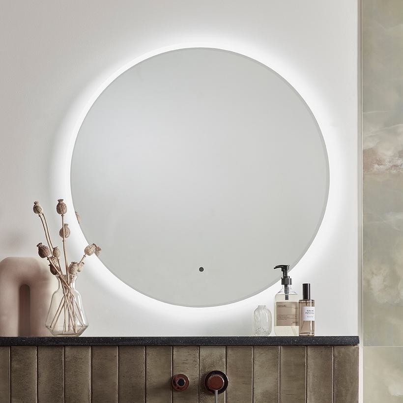 Aster round mirror front on lifestyle