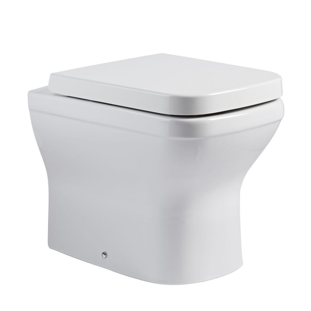 modern white ceramic back to wall toilet pan slide image