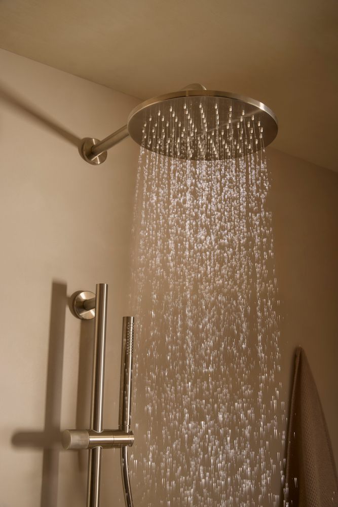 Faber Brushed Nickel Overhead Shower Detail Lifestyle slide image Faber Brushed Nickel Overhead Shower Detail Lifestyle slide image