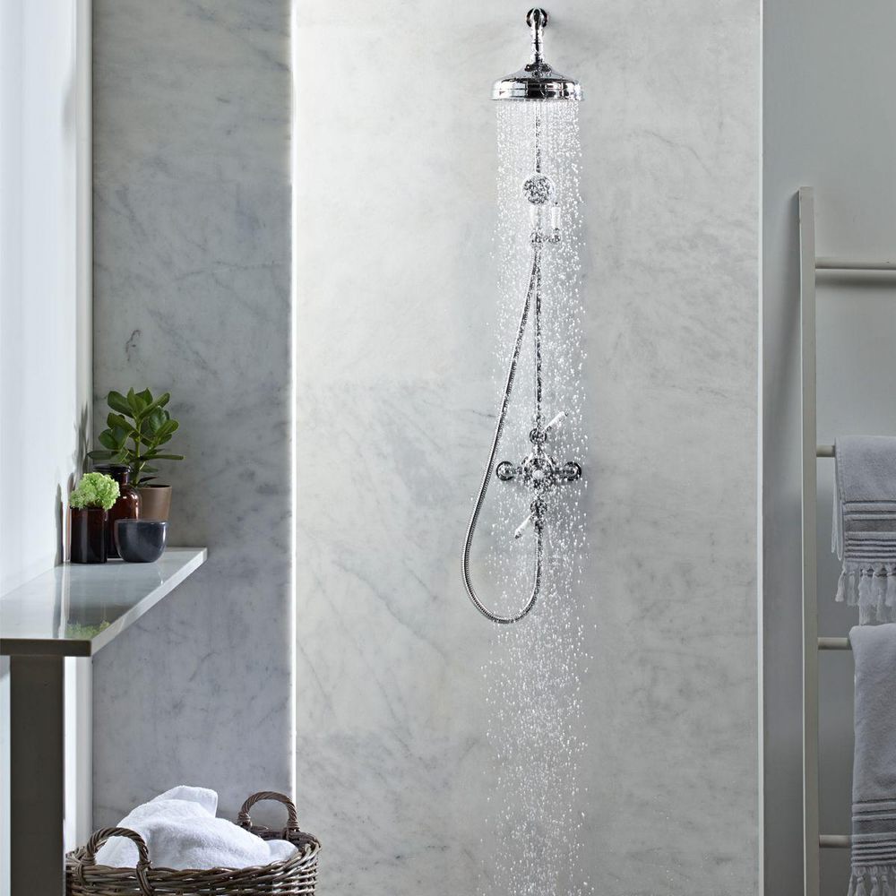 traditional exposed shower with marble shower wall slide image