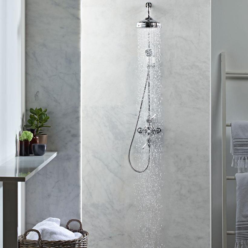traditional exposed shower with marble shower wall