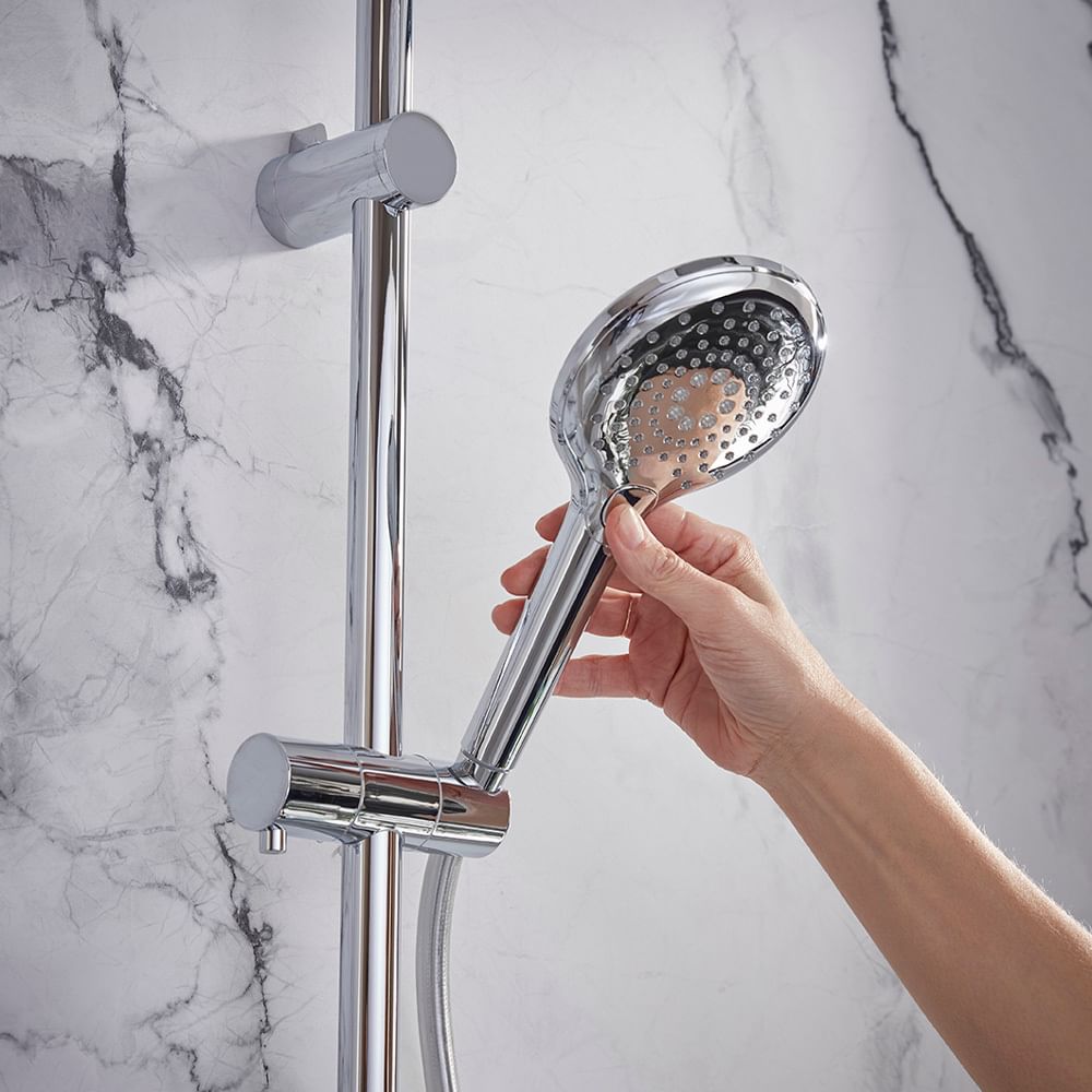 TAV Merit 2 F Chrome handset with hand lifestyle slide image TAV Merit 2 F Chrome handset with hand lifestyle slide image