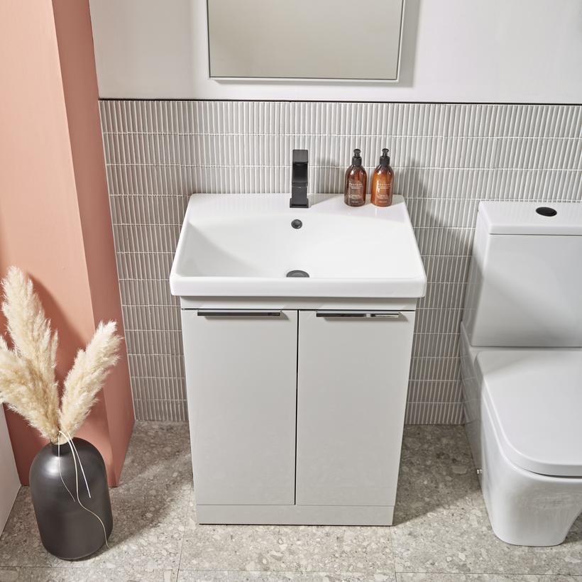 Type 600mm light grey freestanding unit top down with Serenity CC WC and Serve black tap lifestyle