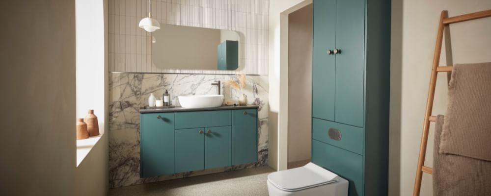 Calm in Matt Viridian Green with a countertop basin and laminate worktop in Riven Slate slide image Calm in Matt Viridian Green with a countertop basin and laminate worktop in Riven Slate slide image