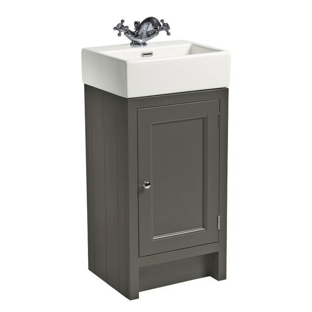 dark green traditional cloakroom unit with basin