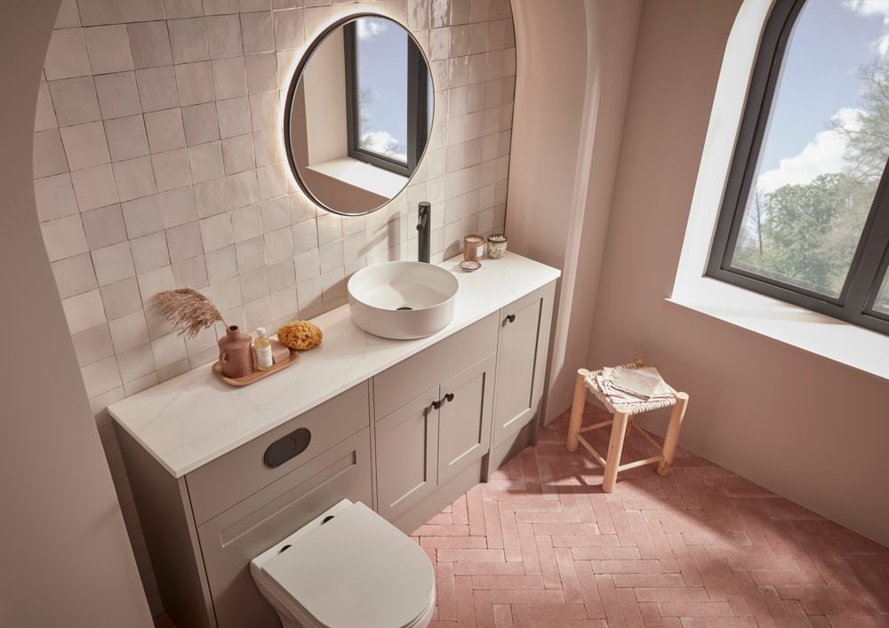 Legacy in Matt Metro Grey with a countertop basin and solid surface worktop in Carrara Marble slide image Legacy in Matt Metro Grey with a countertop basin and solid surface worktop in Carrara Marble slide image