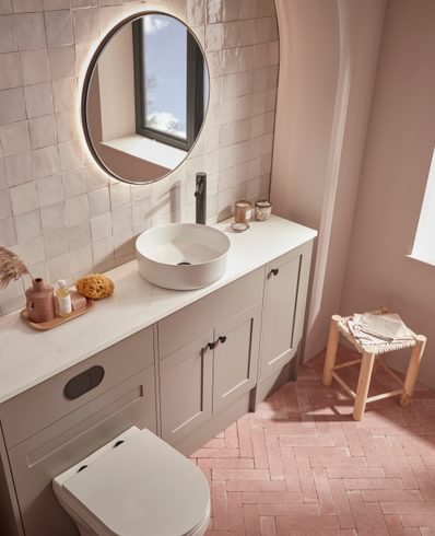Legacy in Matt Metro Grey with a countertop basin and solid surface worktop in Carrara Marble